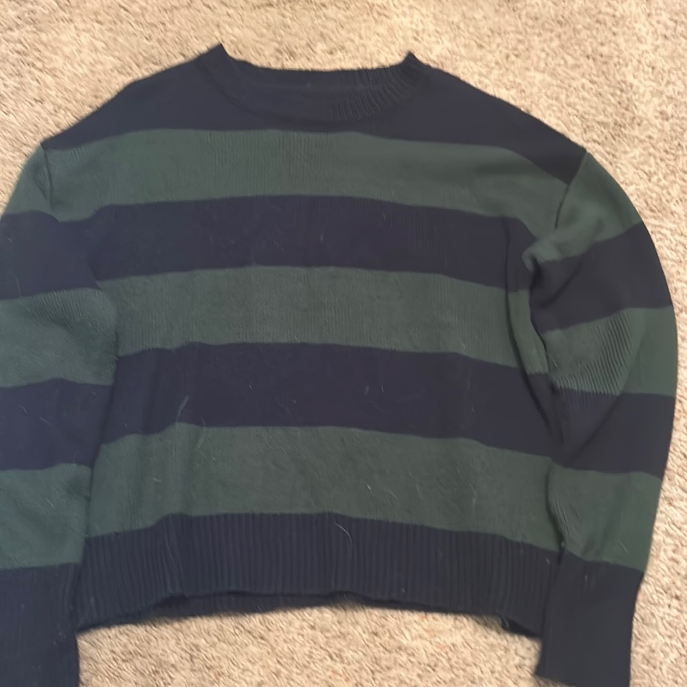 navy and green sweater